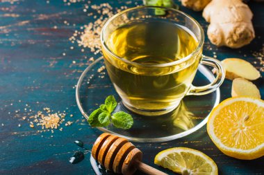Ginger tea with lemon and honey clipart