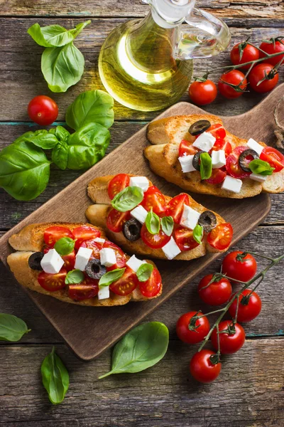 Bruschetta with tomato and feta cheese — Stock Photo, Image