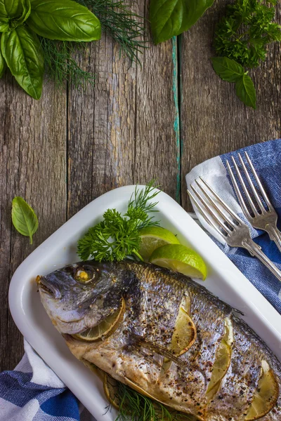 Baked dorado with spicy herbs — Stock Photo, Image