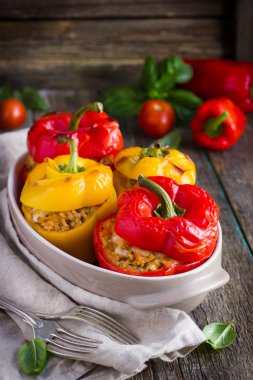 Stuffed peppers with meat, rice and vegetables clipart