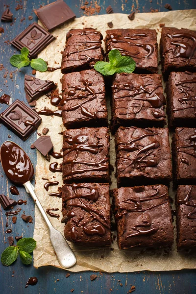 Homemade chocolate brownies on dark background — Stock Photo, Image