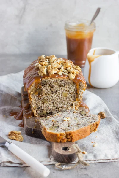 Banana bread cake with walnuts and salted caramel — Stock Photo, Image