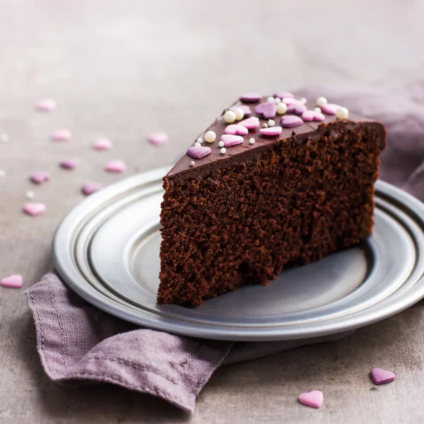 Piece of delicious chocolate cake for romantic dinner — Stock Photo, Image