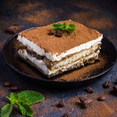 Traditional italian dessert tiramisu on blake plate clipart