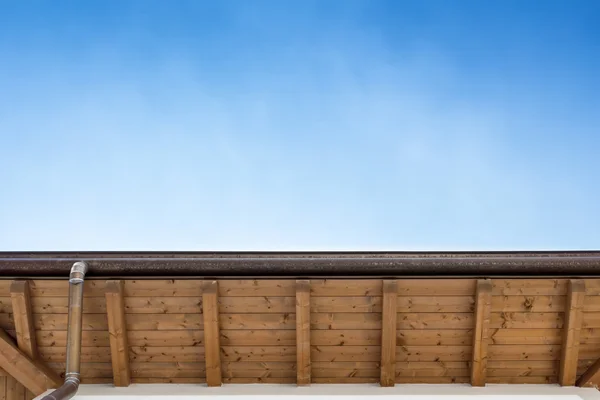 Gutter on the roof top of house — Stock Photo, Image