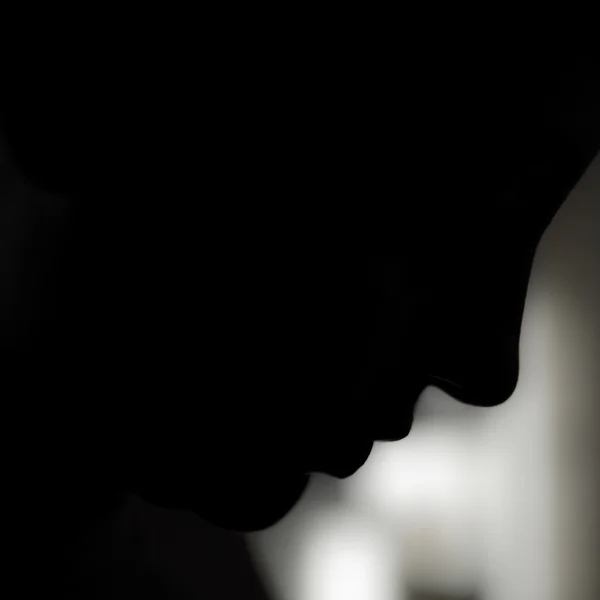 Face in shadow — Stock Photo, Image