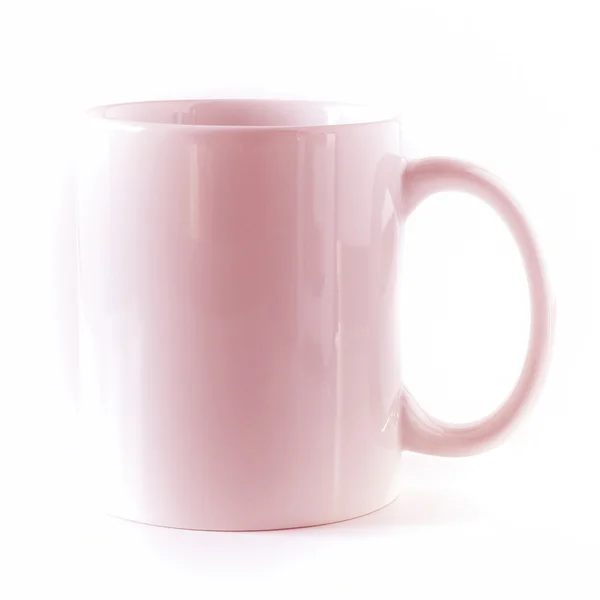 Une tasse rose, vide, isolée sur fond blanc — Photo