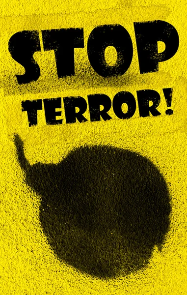 Bombe mit schwarzem Farbspray auf gelbem Hintergrund. — Stockfoto
