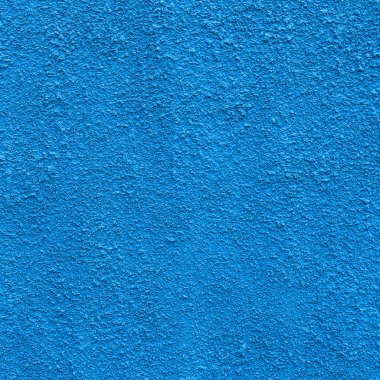 Mavi sıva, kaba dekore edilmiş bir duvar önden görünümü