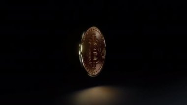 Bitcoin altın sikkesi siyah arkaplanda dönüyor