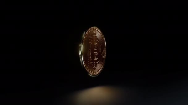 Bitcoin moneda de oro girando sobre fondo negro — Vídeo de stock