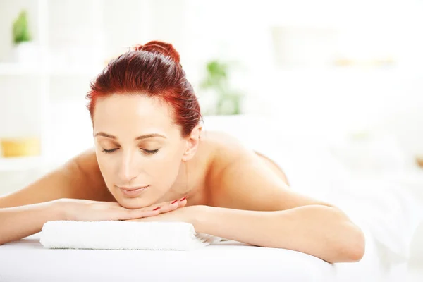 Woman lying in spa — Stock Photo, Image