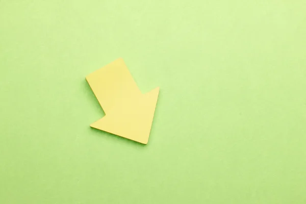 Yellow arrow sticker — Stock Photo, Image