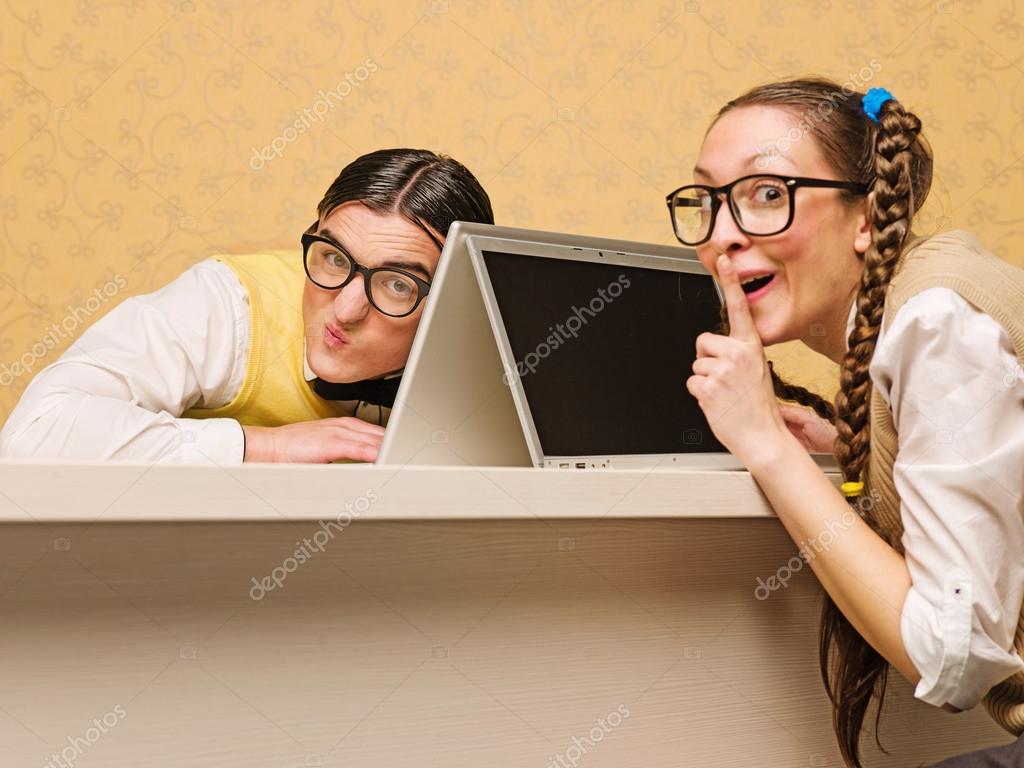 Young nerds sitting at the desk with computers — Stock Photo ... Young nerds sitting at the desk with computers — Stock Photo ...