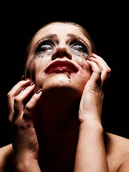 Hysteric woman with smeared makeup — Stock Photo, Image