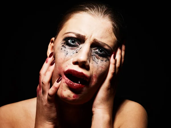Hysteric woman with smeared makeup — Stock Photo, Image