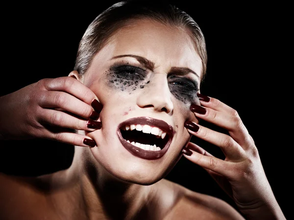 Hysteric woman with smeared makeup — Stock Photo, Image