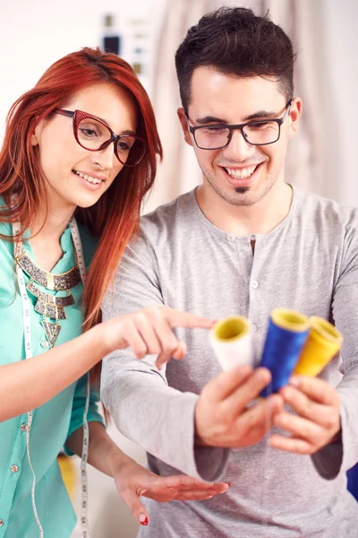 Designers choosing thread for sewing — Stock Photo, Image