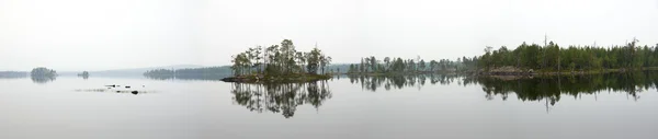 Misty lake panorama