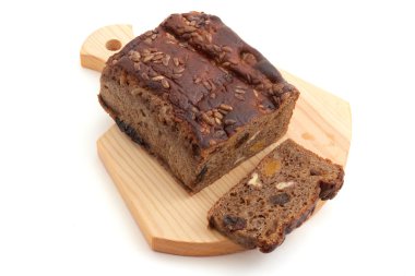 Ahşap tahta üzerinde kahverengi ekmek