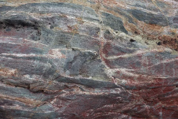 Поверхность природного красного камня в качестве фона — стоковое фото