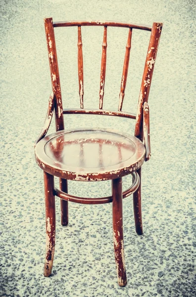 Old red wood chair on the cement floor background — Stock Photo, Image