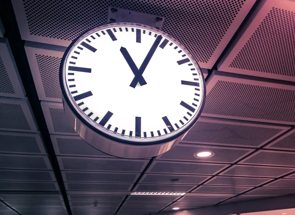 Public clock in railway station — Stock Photo, Image