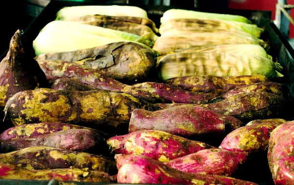 Grilled sweet potatoes and sweet corns — Stock Photo, Image