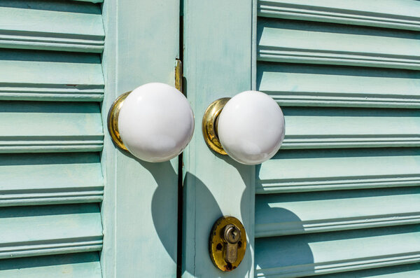 White antique door knob. Outdoor view