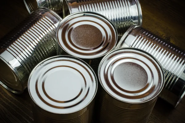 Aluminum cans on wooden background — Stock Photo, Image