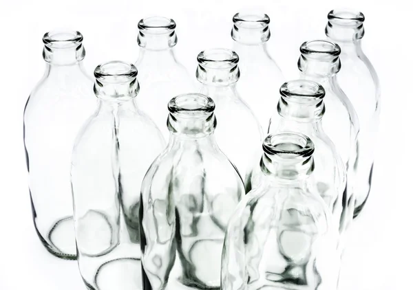Concept van glazen flessen op witte achtergrond — Stockfoto