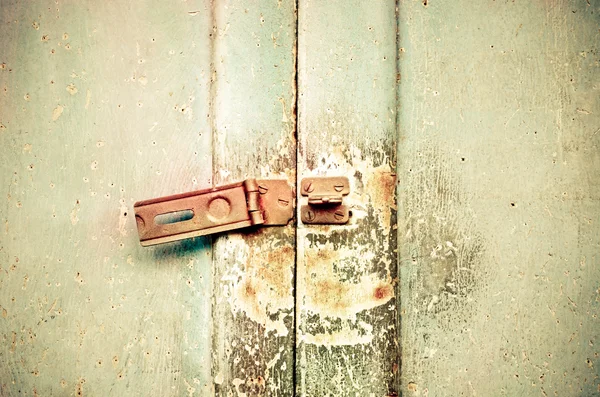 Eski paslı bir kapı kilidi — Stok fotoğraf