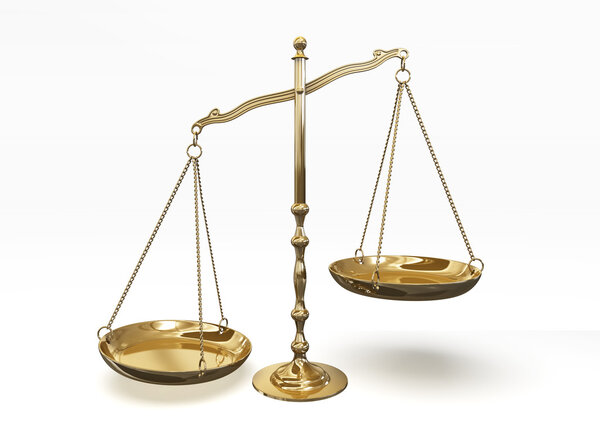 Gold scales of justice isolated on white background with clipping path.