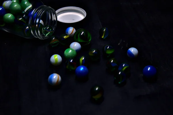Jar Colored Marbles Black Surface — Stock Photo, Image