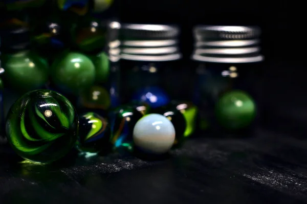 Jar Colored Marbles Black Surface — Stock Photo, Image