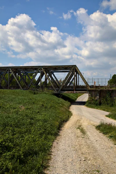 Road Passes Railway Bridge Clear Day Spring Italian Countryside — Φωτογραφία Αρχείου