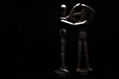 Çaresizlik içinde olan bir mankeni avutmak.