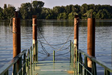 Pier on a lake at sunset