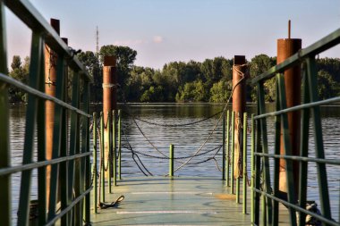 Pier on a lake at sunset