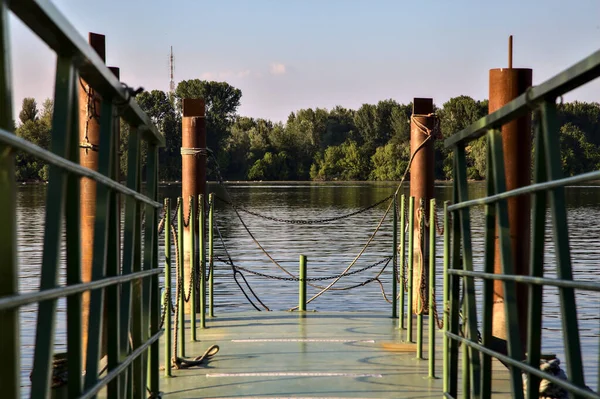Pier on a lake at sunset