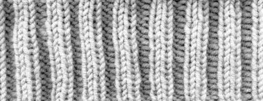 Örülmüş kumaş dokusu, sıcak, rahat örülmüş kumaş arka planı.