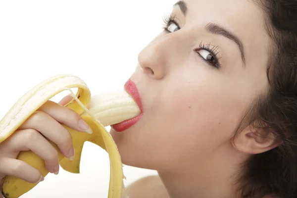 Krásná sexy žena jíst banán — Stock fotografie