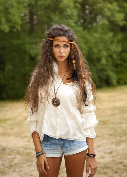 Beautiful hippie girl in the park — Stock Photo, Image