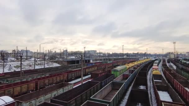 Railway tracks with freight trains, a locomotive timelapse — Stock Video