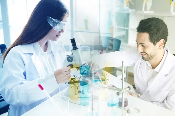 laboratory research and development concept by scientists with lab glassware, double exposure effect, experimental chemical and drug