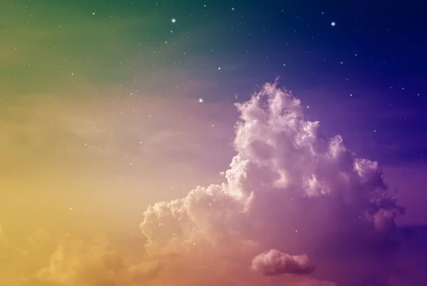 colorful night sky with cloud and stars in pink and blue tone