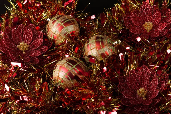 Red Gold Christmas Balls Lily Flowers Lie Bright Tinsel New — Stock Photo, Image