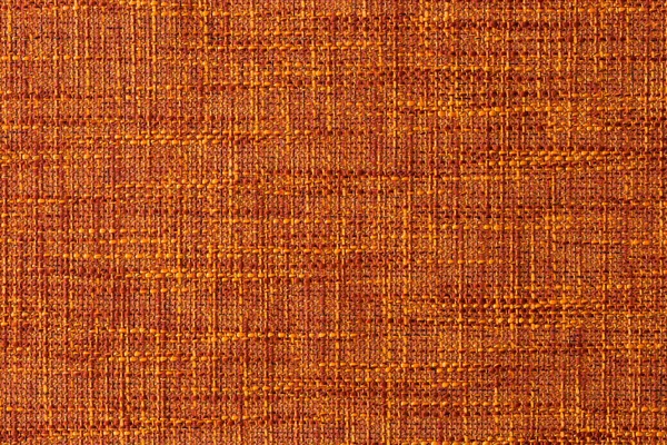 Orange rough textile texture, canvas background. Matting.