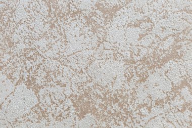 Arka plan ve tasarım için soyut desenli sahte süetin bej dokusu.