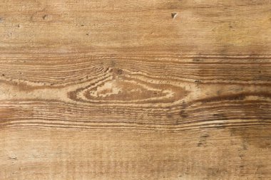 Telaffuz edilmiş lif desenli ve koyu benekli eski bir ahşap tahta dokusu..